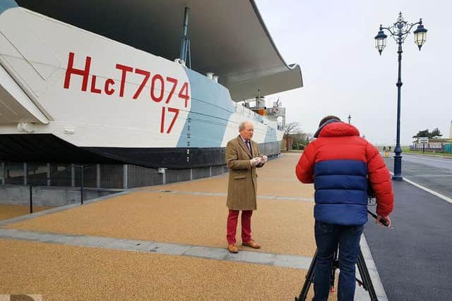 Bargain Hunt presenter Charlie Ross pictured filming outside the D-Day Story museum in Southsea. Photo: D-Day Story