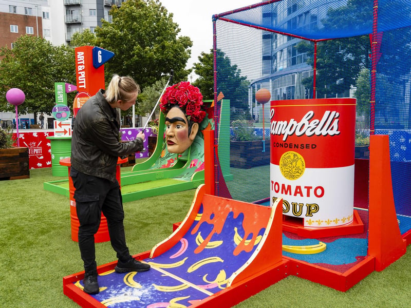 The new Art & Putt site has proved popular with Gunwharf Quays visitors - so much so that people have even enjoyied a game of mini golf in the rain. Picture: Matthew Clark