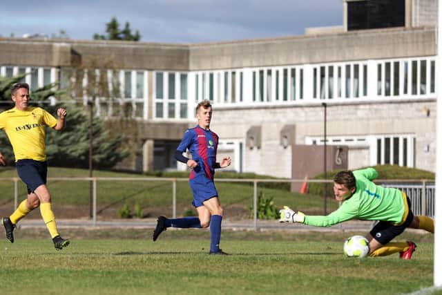 US Portsmouth (blue/maroon) would win promotion to the Wessex League Premier if they FA ploughed on with restructuring plans and adopted the Project Non-League proposal of working out points-per-game ratios based on all league games since the start of the 2019/20 season.  Picture: Chris Moorhouse
