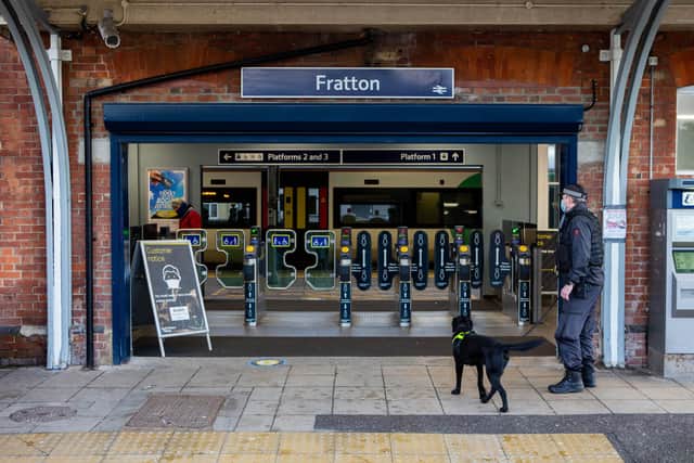A police officer and sniffer dog at the entrance of Fratton Railway station.

Picture: Habibur Rahman