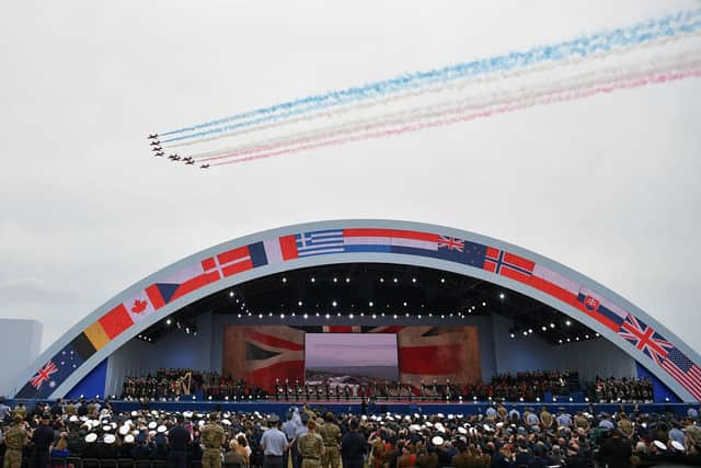 The Red Arrows flay past over Southsea Common on June 5, 2019.