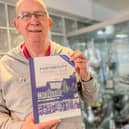 Alan Knight with the 125 history being sold to raise funds for ‘Pompey Family’ charities.