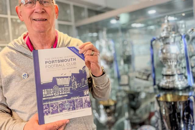 Alan Knight with the 125 history being sold to raise funds for ‘Pompey Family’ charities.