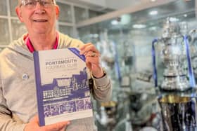 Alan Knight with the 125 history being sold to raise funds for ‘Pompey Family’ charities.