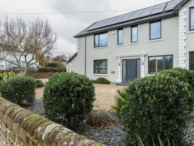 This property also has a solar panel system and a Tesla battery to charge your electric vehicle.