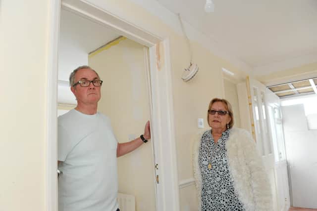 Anita (66) and Sid Hopkins (58) roof on their house in Plumley Walk, Havant, they have rented from Guinness for 25 years blew off during Storm Eunice as well as the porch roof at the front of the property. As a result everything inside the house was soaked and damaged and they have been living in alternative accommodation for the last 9 weeks.Picture: Sarah Standing (180422-1481)