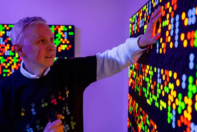 Visually impaired Portsmouth artist Clarke Reynolds at his new solo exhibition, Journey by Dots, which is on at Aspex from 8 April to 26 June 2022.