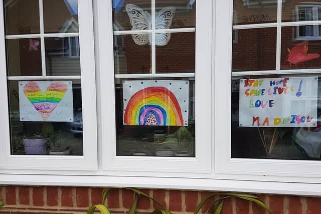 Maddison Moore, 7 from Havant, created some rainbow pictures which she posted through all the doors on her street, who all displayed them to spread some cheer