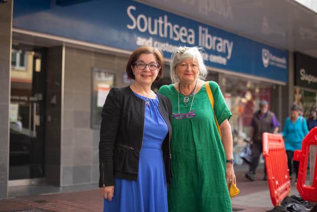 Freya Perry with library supervisor Angela Gonzalez outside Southsea Library where Freya's art is being displayed until September 13