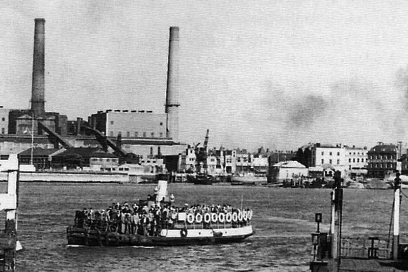 A packed Gosport Ferry, Portsmouth Power Station and the floating bridge to the right.