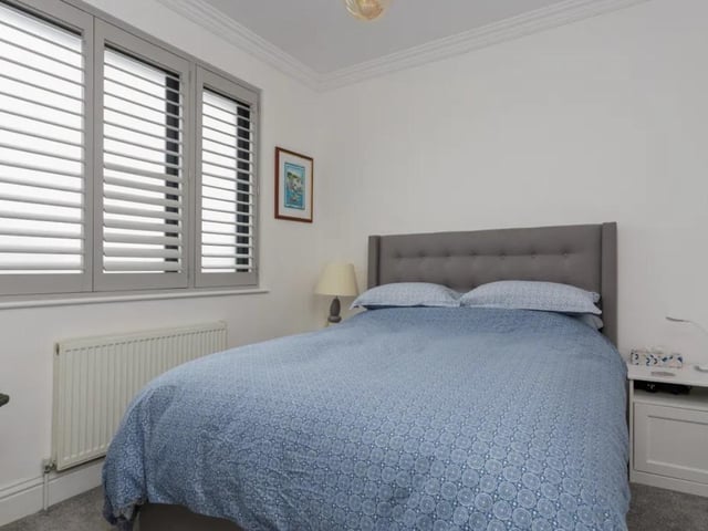 The listing says: "During the 17th century, there was originally a brewhouse ‘To live and let live’ on this site - there is a local documented history on this property. It was bombed during the war, rebuilt, and recently extensively re-modeled, providing 5 bedrooms, 4 bathrooms, 3 reception rooms, an insulated garage currently used as a gym, a swim spa, and a Hot tub."