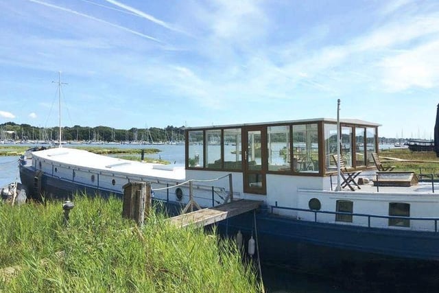 This three-bed houseboat in Bursledon is on the market for £169,950.