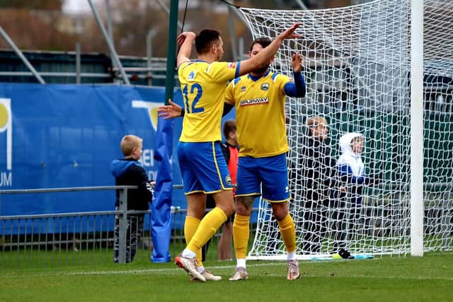 Brett Williams and Dan Wooden celebrate a Gosport goal against Tiverton. Picture by Tom Phillips