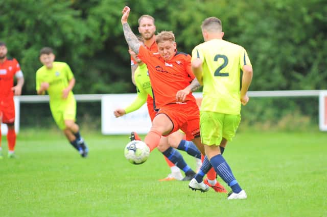 Jake Raine, pictured in FA Cup action against Horndean last month, is available after a four-game suspension for Tuesday's Wessex Premier meeting.