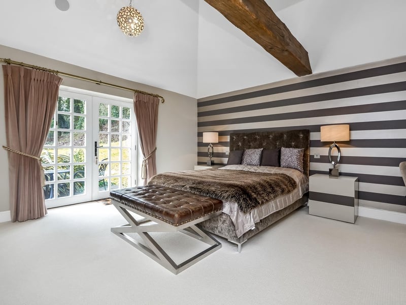 This four bedroom detached house in Hambledon is on sale for £1,895,000. It is listed by Fine and Country