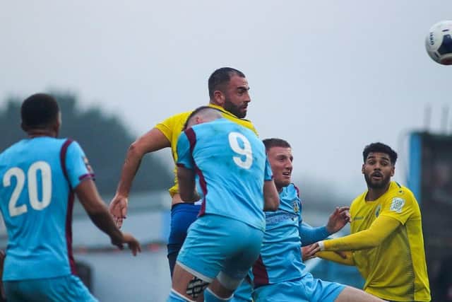 Simon Walton heads Hawks' winner at Weymouth on New Year's Day. Photo By Kieron Louloudis