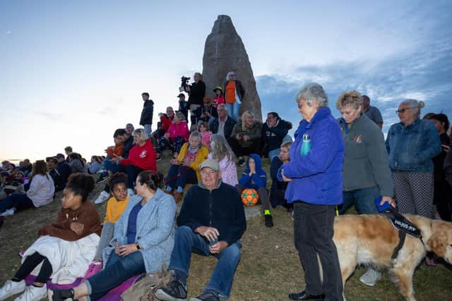 A beacon was lit Thursday evening on Hayling Seafront by the Havant Lord Mayor Cllr Diana Patrick to mark the Queens Jubilee, as hundreds of locals gathered to watch the event.
Pictured - Crowds formed on the COPP Memorial on Hayling Seafront to see the beacon be lit.
Photos by Alex Shute