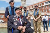 D-Day veteran Joe Cattini (98) escorted by Portsmouth Sea Cadet Hayden Temperton (13). Picture: Mike Cooter (250621)