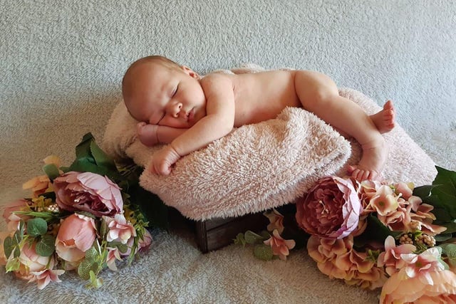 Ada Grace Garrison was born on April 26. Her mum, Jenny Kerr, said she created her own photoshoot for her new arrival because of the circumstances.