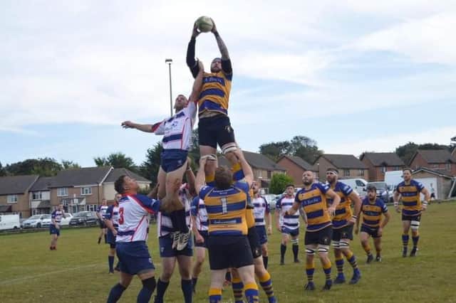 Toby Woodford rises highest to collect a line-out for Gosport & Fareham at Sandown & Shanklin. Picture: Carol Snowden