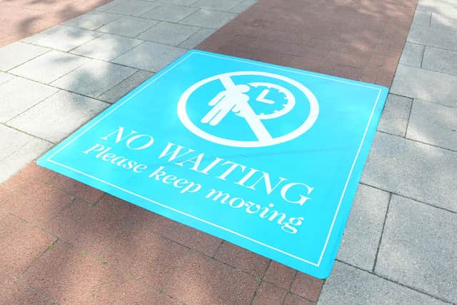 'No Waiting' stickers have appeared across the centre to encourage safe social distancing. 

Picture: Sarah Standing (160620-106)