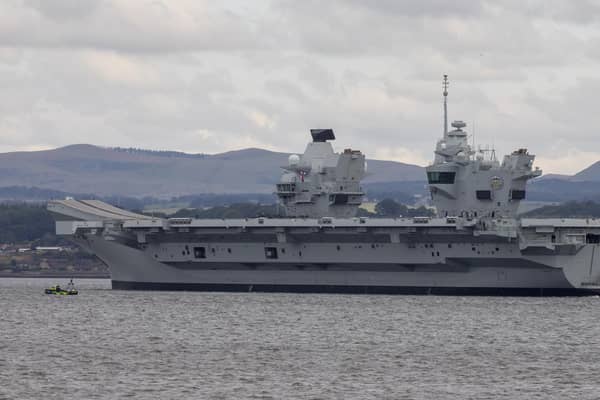 Royal Navy aircraft carrier HMS Prince of Wales sitting on anchor in the Firth of Forth after leaving Rosyth Dockyard. Picture taken on July 23. Picture: Katielee Arrowsmith/SWNS.