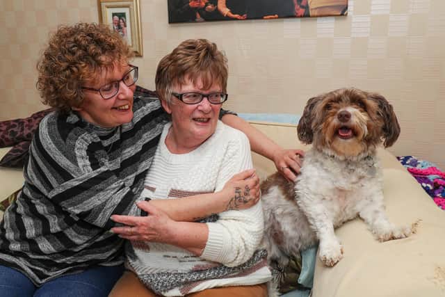 Lisa and Angela with Angela's dog Alfie. Picture: Stuart Martin (220421-7042)