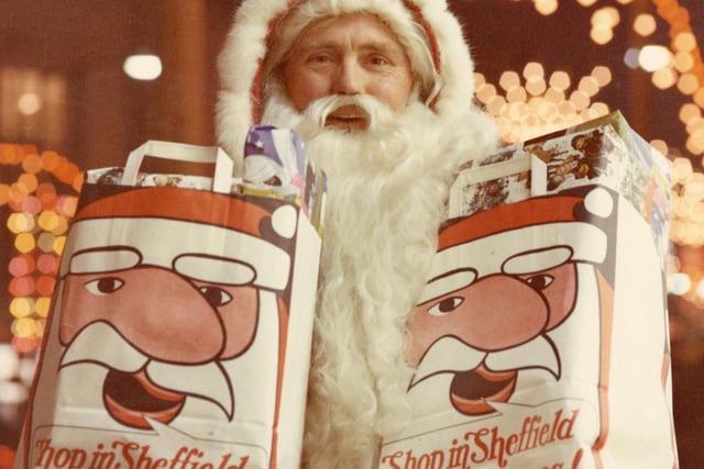Christmas lights in the city centre featuring Santa Claus, c. 1970.
