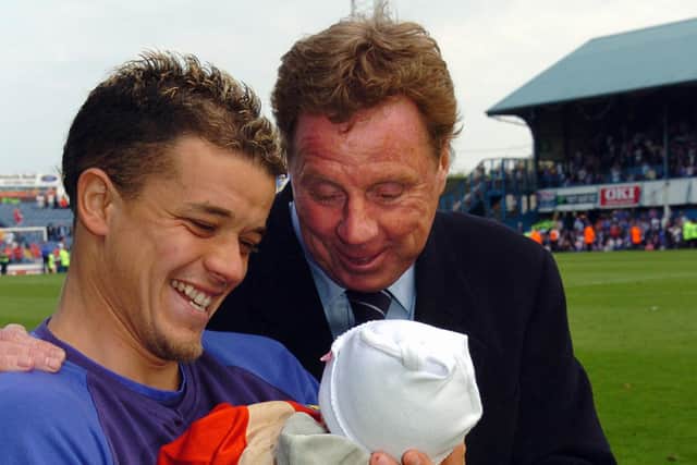 Andres D'Alessandro with daughter, Martina, on Pompey's lap of appreciation after the final day against Liverpool, with Harry Redknapp getting an introduction. Picture: Malcolm Wells
