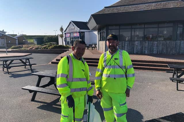 Colas employees Bill Willis, left, and Alan Walker have been out tidying up the seafront - and say parts of the Common and the beach have been left in a 'grubby' state.
Picture: Richard Lemmer