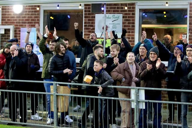 Gosport fans celebrate their team's stoppage time winner. Picture by Tom Phillips