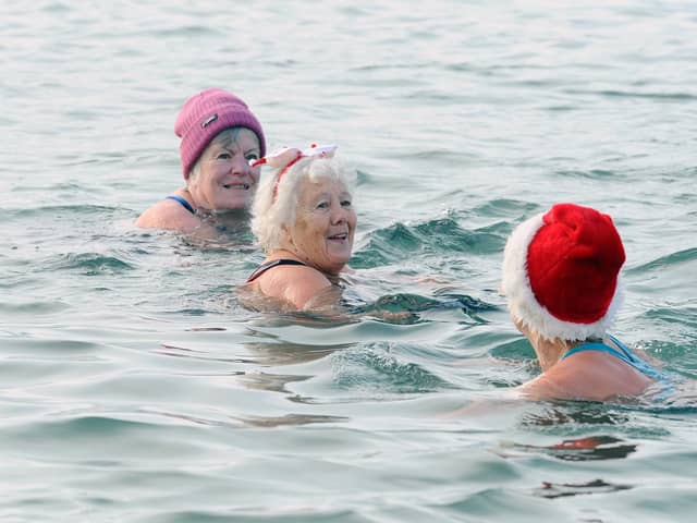 Solent Swim School held their annual Boxing Day dip in the sea at Lee-on-the-Solent, on Thursday, December 26, 2024.  Picture: Sarah Standing (261224-595)