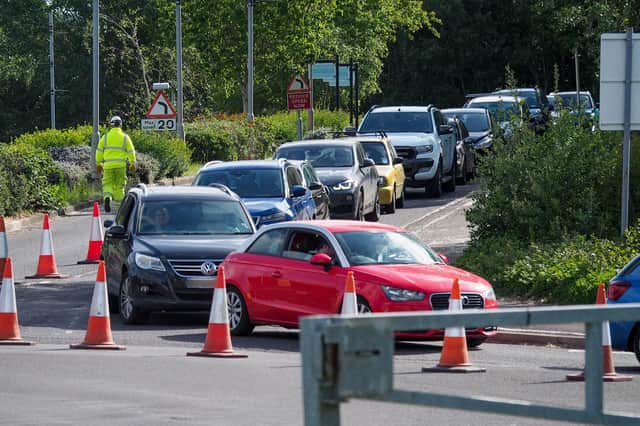 Cars queue up for the tip at Port Solent when it reopened after lockdown in May last year 
Picture: Habibur Rahman