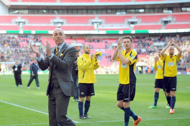 Mick Catlin applauds the Gosport fans after the 2014 FA Trophy final - six years ago today. Picture: Paul Jacobs