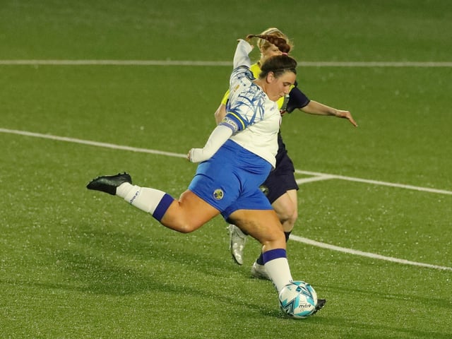 Hawks' Chloe Dark pulls the trigger. Picture: Dave Haines