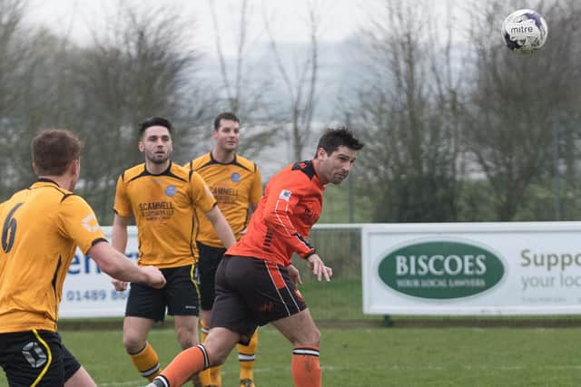 Steve Ramsey heads a goal for Portchester against Hamworthy in 2017/18. Picture: Keith Woodland