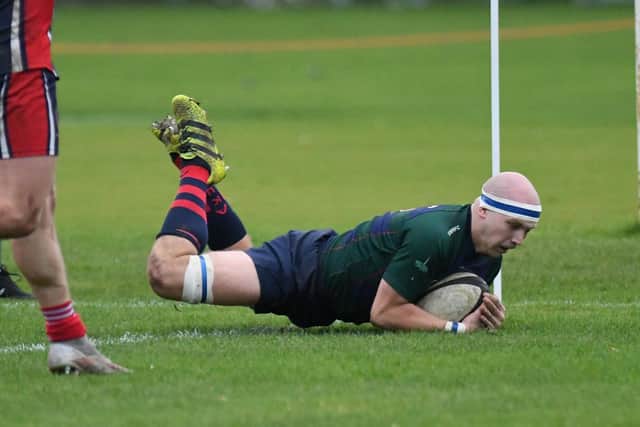 Will Dixon dives over for US Portsmouth. Picture: Neil Marshall