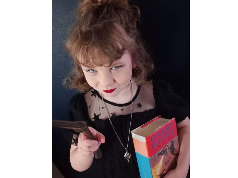 Taking on the role of the villian Bellatrix Lestrange, Meredith, age 6, looks superb.