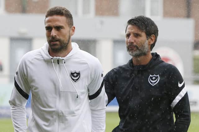 Clark Robertson, left, with Pompey head coach Danny Cowley