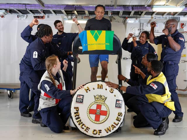 Sailors on HMS Prince of Wales pictured as they take on their epic fundraising run. Photo: LPhot Finn Hutchins