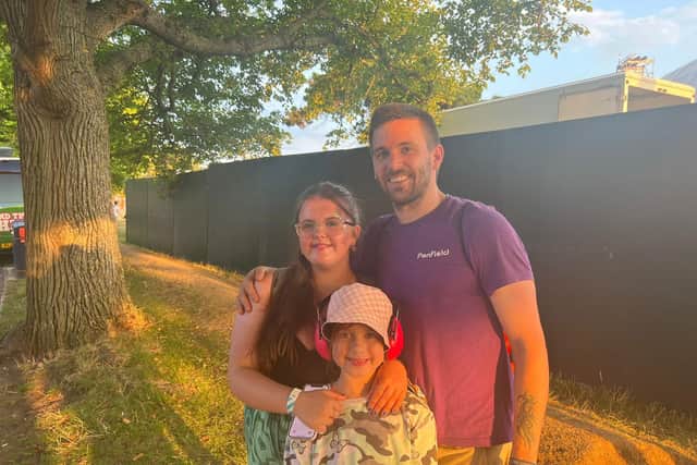 Amy with older sister Olivia, 15, and dad Chris Wright, 35. Victorious 2022 was Amy's first ever festival. Picture: Richard Lemmer.