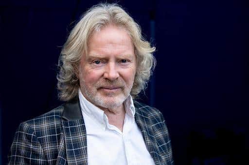 Reg Meuross plays with his band at Wickham Festival 2025 on Sunday, August 3