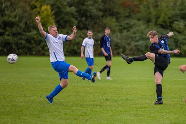 Padnell (blue) v AC Copnor Reserves. Picture: Mike Cooter