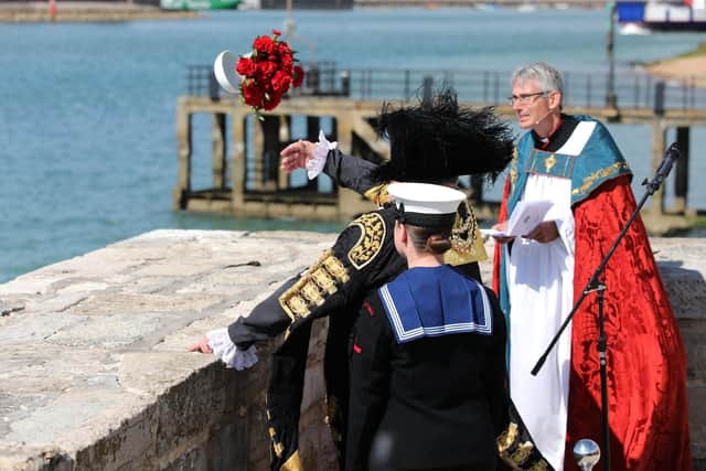 The Lord Mayor of Portsmouth throws a wreath into the sea at the annual service of remembrance for those who have lost their lives at sea and for Admiral Lord Nelson.
Picture: Sam Stephenson