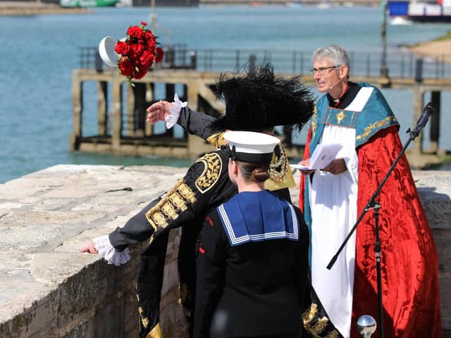 The Lord Mayor of Portsmouth throws a wreath into the sea at the annual service of remembrance for those who have lost their lives at sea and for Admiral Lord Nelson.
Picture: Sam Stephenson
