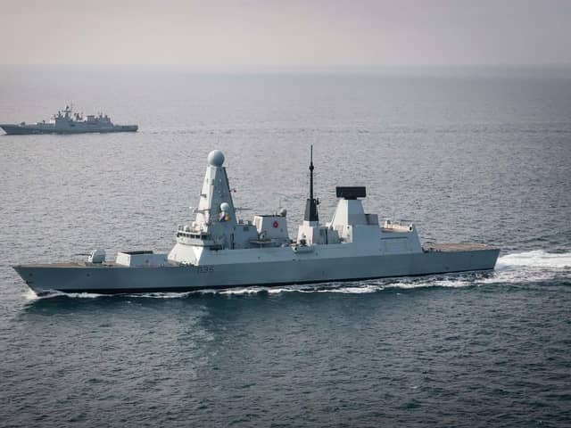 HMS Defender has returned home to Portsmouth, where she will be undergoing a major refit. Pictured is her monitoring Russian frigate Admiral Grigorovich. Picture: Royal Navy.