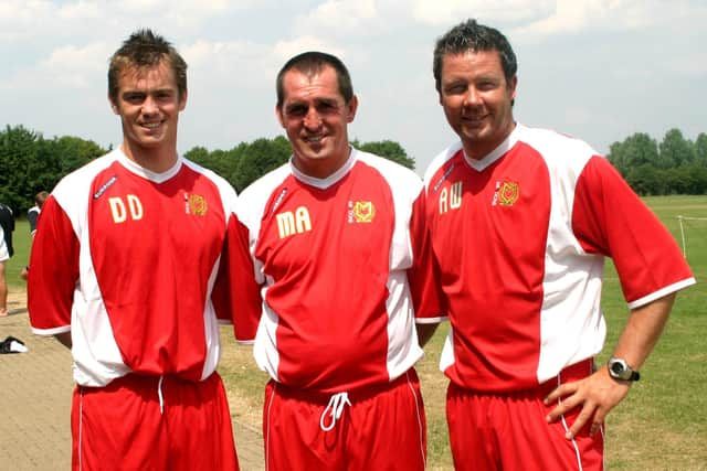 Adrian Whitbread has carved out a coaching career following retirement. Here he's pictured (right) at MK Dons alongside manager Martin Allen. Picture: Phil Smith