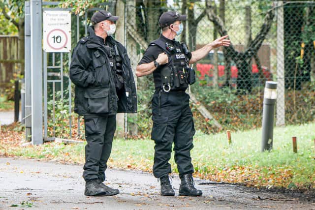 Police pictured in Newgate Lane, Fareham, on October 2 during a raid. Picture: Habibur Rahman
