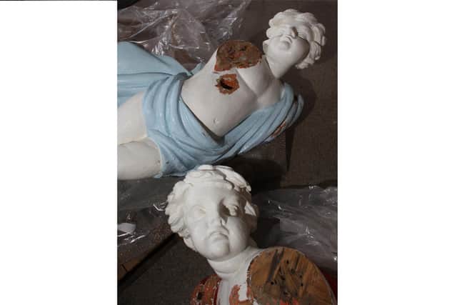 Remains of the figurehead that was created for HMS Victory in 1815 but was accidentally sliced to pieces by contractors in 2009. Photo: National Museum of the Royal Navy