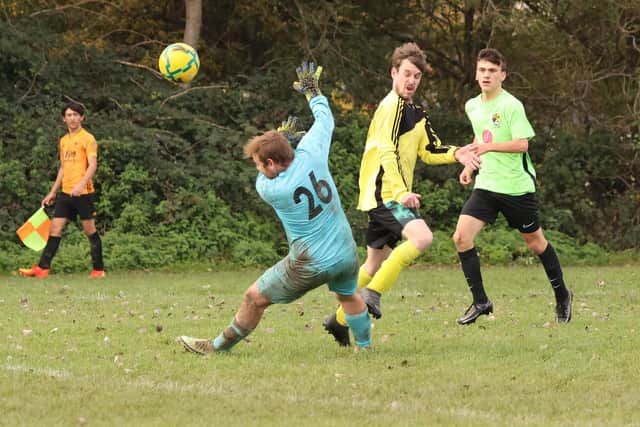Hatton Rovers (yellow) score in their 3-1 Division 5 victory over Fratton Trades Reserves. Picture  by Kevin Shipp